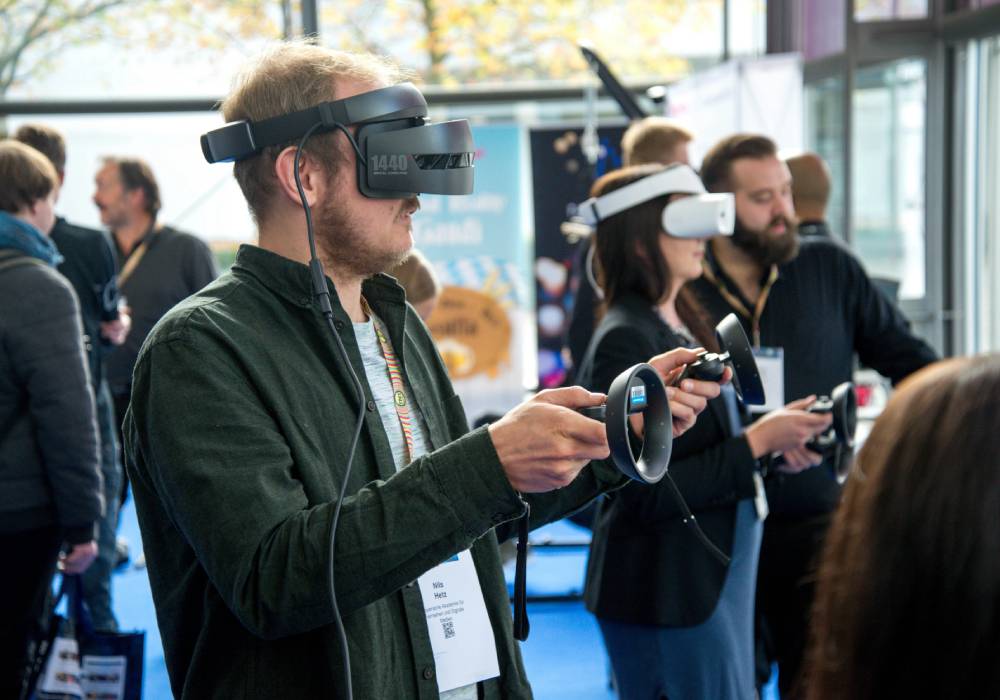 Virtual Reality Headsets being worn at a Rock Paper Reality event